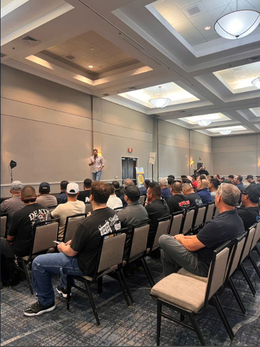Seated attendees listening to a presenter at The Builder’s Convention 2026